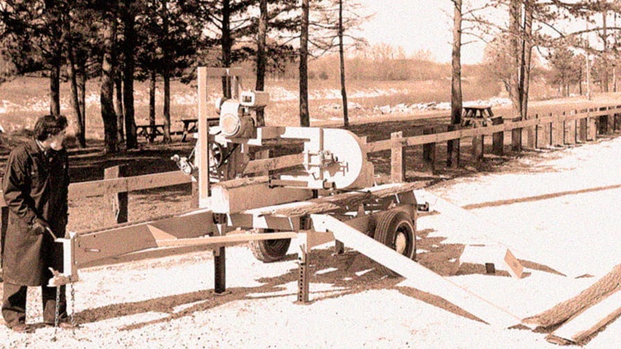 Wood-Mizer founder Donald Laskowski and the first LT40 sawmill, in 1982